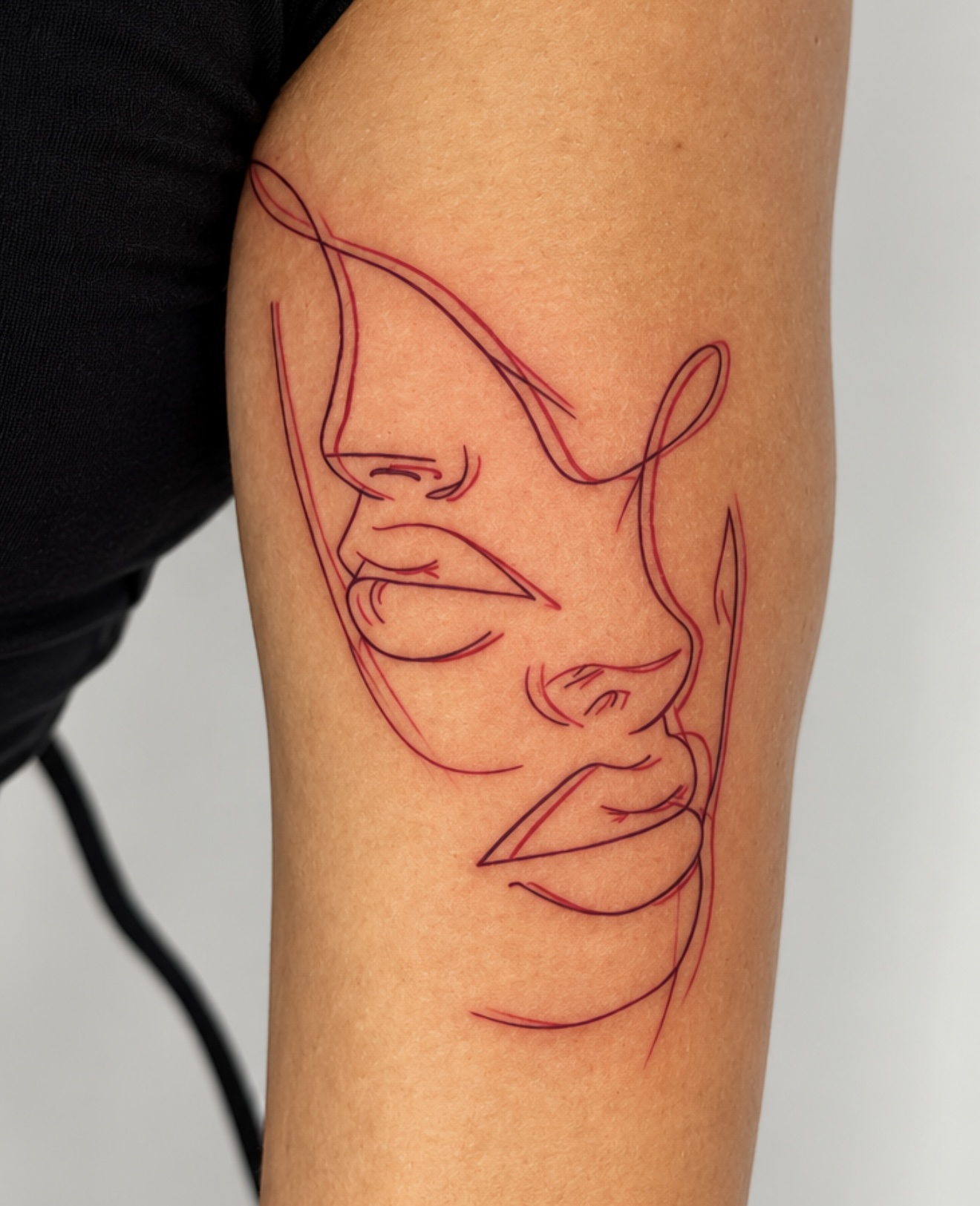 Red abstract face tattoo