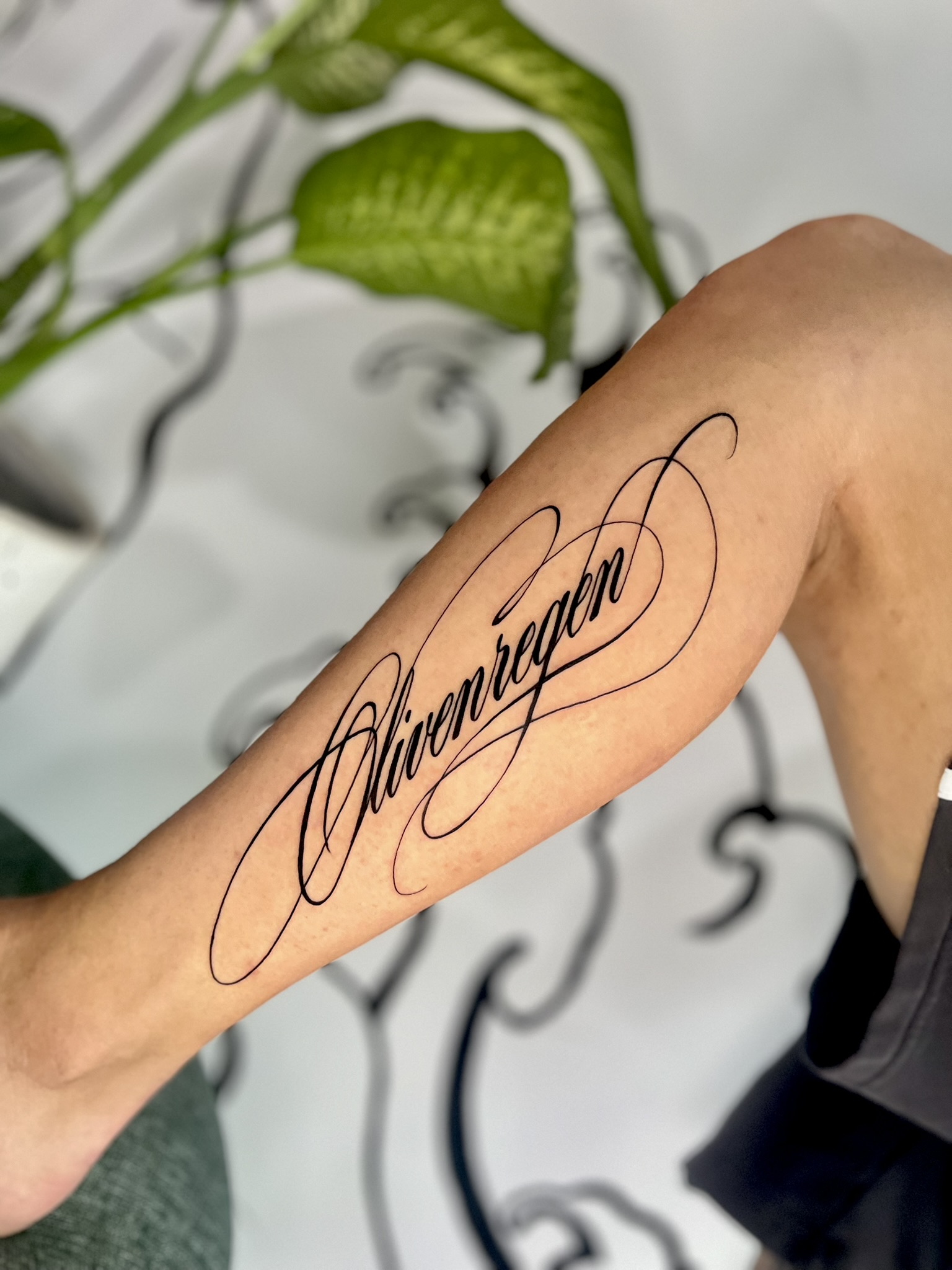 Lettering tattoo on an arm